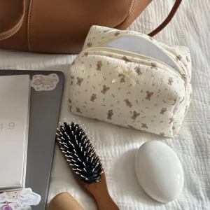 Cute bear cosmetic bag with lovely bow detail, large capacity travel makeup wash bag for women.