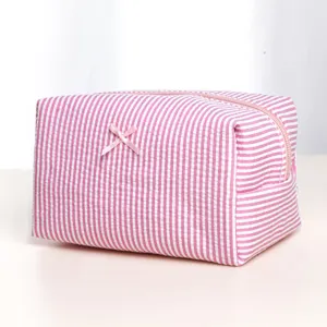 Pink and white striped cosmetic bag with cute bow, large capacity travel wash organizer.