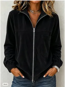 Women black corduroy zip up jacket detail view, featuring front pocket and metal zipper.