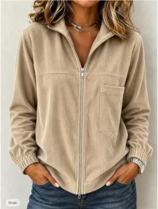 Corduroy jacket detail showing front zipper closure, chest pocket, and soft texture.