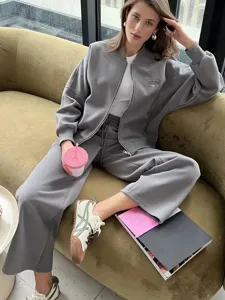 Women casual grey tracksuit set zip up hoodie and wide leg pants for autumn winter daily wear.