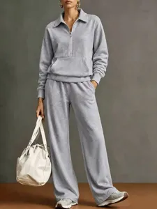 Donna felpa grigia mezza zip e pantaloni larghi tuta set outfit vista principale