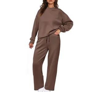 Detail view of the brown long-sleeve sweatshirt and wide-leg sweatpants set, comfortable casual wear.
