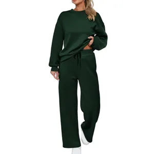 Stylish women solid color long sleeve sweatshirt and wide leg pants knit tracksuit set.