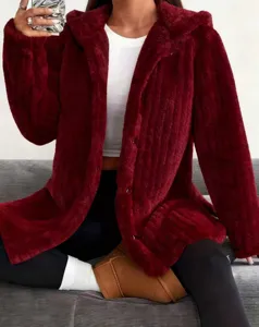 Detailed view of the plush hooded coat in burgundy, soft fleece texture and cozy fit.