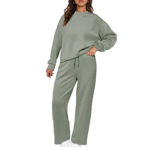 Detailed view of the cozy sage green loungewear set, long sleeve sweatshirt and pants.