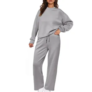 Detailed view of the cozy grey knit two-piece tracksuit, showing soft texture and fine stitching.