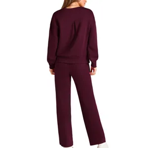 Back view detail of women knitted long sleeve top and wide leg pants lounge set in maroon.