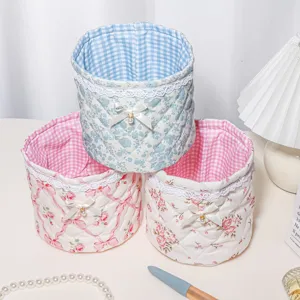 Quilted storage basket with lace bow, cute ballet style desktop organizer for small sundries.