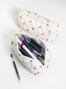 Quilted floral pencil case and cosmetic storage pouch, cute grid pattern design for daily use.