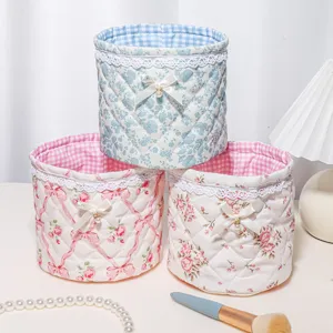Fabric storage basket cute quilted desktop organizer with lace bow for makeup desk tidy.