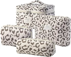 Quilted cosmetic bag set with stylish leopard print pattern, large capacity and portable design.