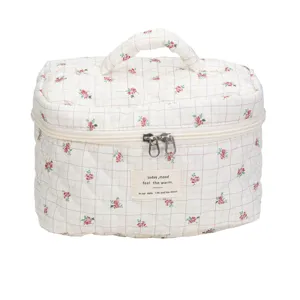 Quilted floral makeup bag with handle, large capacity travel cosmetic organizer pouch.