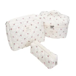 Quilted floral cosmetic bag set, portable travel storage pouch with cute plaid design.