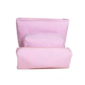 Pink striped makeup bag set, portable zipper toiletry pouch, large capacity travel storage.