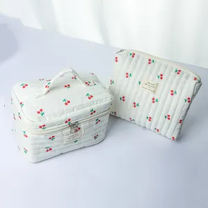 Quilted cherry print cosmetic bag set, spacious portable travel makeup storage pouch.