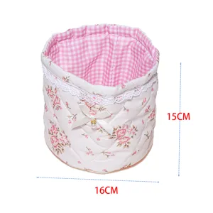 Pink floral fabric storage basket with cute bow lace trim and gingham lining 15x16cm