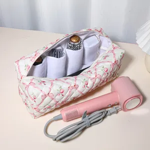 Quilted floral hair styling tool organizer bag and pink hair dryer set portable storage