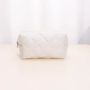 White quilted cosmetic bag with black polka dots, portable large capacity storage organizer.