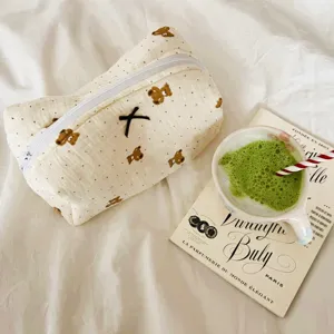 Cute bubble gauze cosmetic bag with brown bear print and bow, portable toiletry storage bag