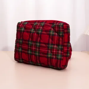 Quilted red plaid cosmetic bag detail view, portable storage pouch for travel and daily use.