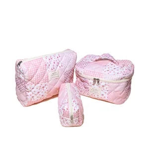 Pink quilted cosmetic bag set, floral and grid patchwork travel makeup storage organizer.