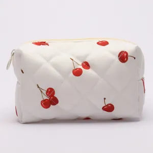 Cherry quilted padded cosmetic bag, cute zipper travel makeup storage pouch for daily use.