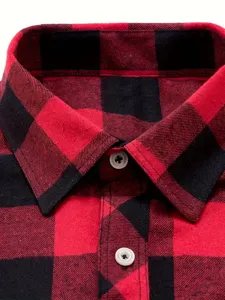 Red and black plaid pattern detail view of men's casual flannel shirt collar and buttons.