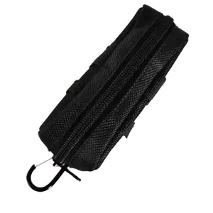 Close-up detail of the black golf ball storage pouch with durable zipper and carabiner hook.