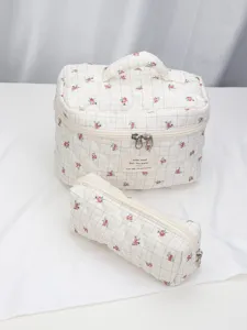 Quilted floral cosmetic bag set, portable travel storage pouch with grid pattern and zip.