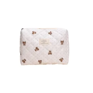Quilted cosmetic bag with cute brown bear pattern and diamond lattice design, large capacity.