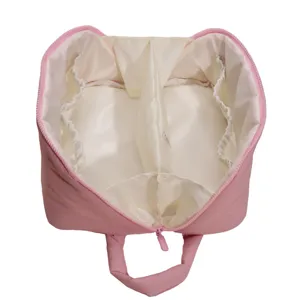 Minimalist solid color puffy cosmetic bag with large capacity and portable waterproof design.