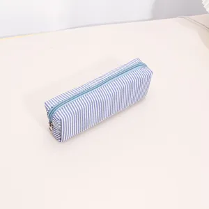 Blue and white striped pencil case zipper storage pouch portable makeup cosmetic bag detail view.