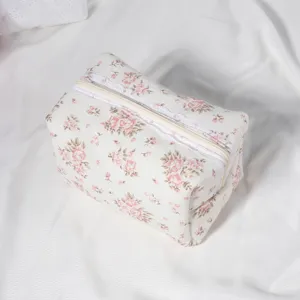 Quilted floral makeup bag with lace trim and zipper, cute portable cosmetic pouch for women.