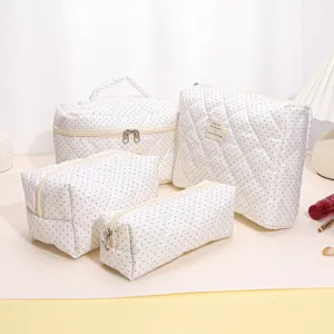 White polka dot quilted cosmetic bag set, portable large capacity travel makeup storage pouch.