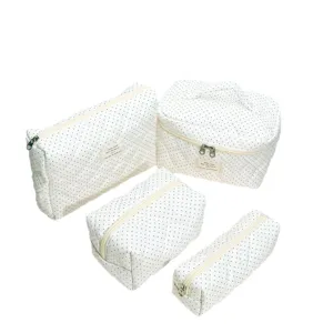 Quilted polka dot cosmetic bag set, soft large capacity makeup pouch for travel and daily storage.