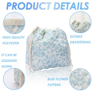 Quilted cosmetic pouch detail showcasing soft polyester fabric and cute blue floral print.