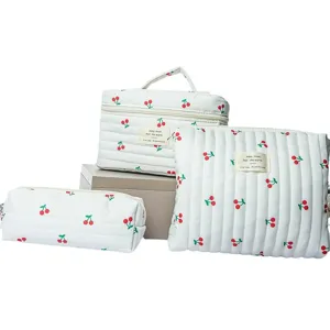 Quilted cosmetic bag set with sweet cherry print, large capacity travel makeup storage organizer.