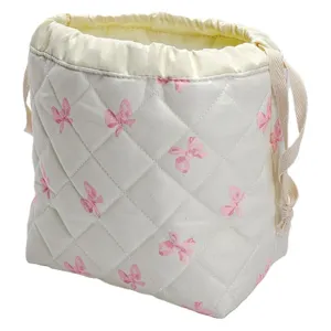 Quilted cosmetic pouch with cute bow pattern, large capacity portable travel makeup storage bag