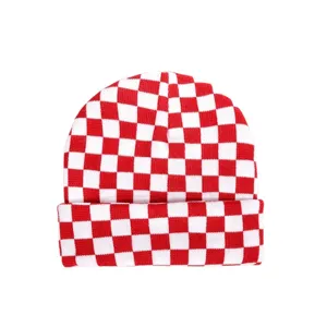 Classic red and white checkered knitted beanie, stylish street fashion warm cold hat.