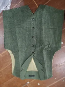 Men green herringbone tweed vest detail, casual business suit waistcoat for wedding.
