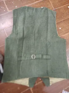 Men's vintage herringbone tweed vest detail, British business casual waistcoat back view.