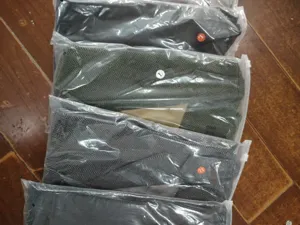 Men's herringbone waistcoat business casual wedding suit vest neatly packaged in bags.