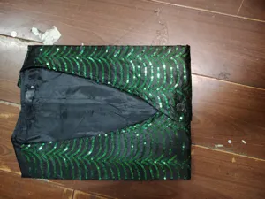 Men's green sequin waistcoat detail, black sleeveless stage performance party vest top.