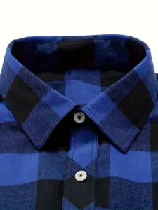Detail view of men's blue and black flannel plaid shirt collar and button placket.