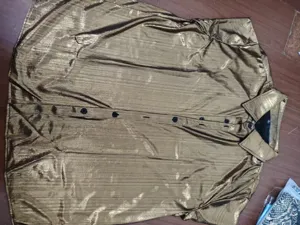 Chemise à manches longues dorée métallique pour homme costume de scène rétro disco