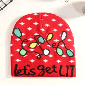 Christmas red knitted beanie hat with festive light pattern and stylish winter streetwear design.
