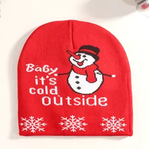 Red knitted winter beanie hat featuring cute snowman graphic detail and festive holiday text.