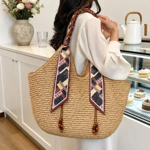 Handmade straw woven tote bag for women, large capacity shoulder bag with stylish silk scarf.