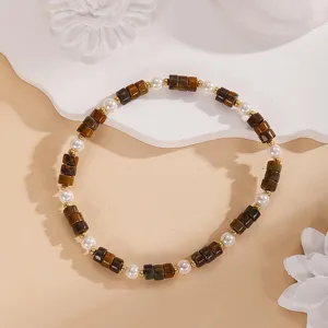 Bracciale di perle vintage con pietre marroni e perle bianche gioiello elegante